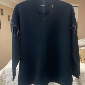 Beautiful sweater with stone details sleeves